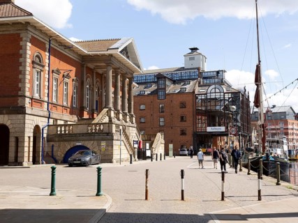 Historic and modern buildings waterfront at the Wet Dock, Ipswich, Suffolk, England, UK, left is