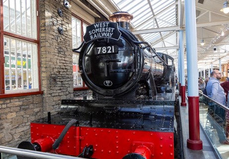 Old steam engine McArthur Glen designer outlet former railway works, Swindon, Wiltshire, England,