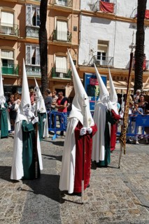 Semana Santa, procession with Nazarenos and tourists, celebrations in Cadiz, Spain, Europe