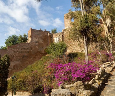 Historic walled defences to Moorish citadel fortress palace of the Alcazaba, Malaga, Andalusia,