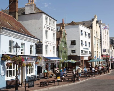 Pubs and old historic buildings on quayside at Poole harbour, Poole, Dorset, England, UK