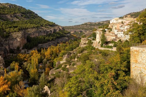 Landscape scenery of river Rio Jucar gorge with historic buildings, Cuenca, Castille La Mancha,