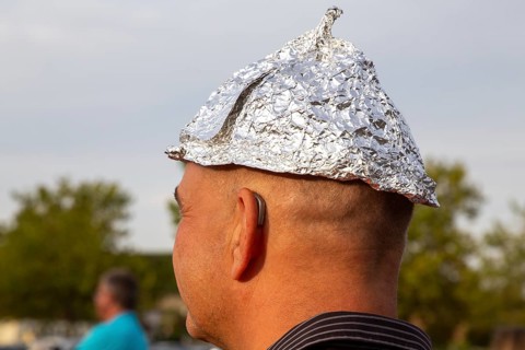 Self-deprecating aluminium hat wearer at a Monday demonstration against the corona measures in Bad
