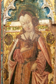 Medieval paintings of saints on rood screen inside church of Saint Andrew, Bramfield, Suffolk,