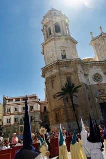 Semana Santa, procession with Nazarenos and tourists, celebrations in Cadiz, Spain, Europe