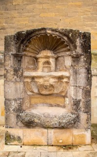 Historic carved stonework of water fountain in village of Laguardia, Alava, Basque Country,