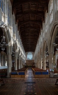 Interior of Holy Trinity Church, Long Melford, Suffolk, England, UK view down nave to east window