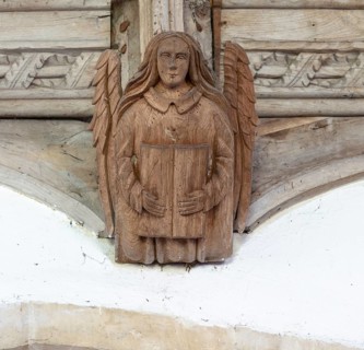 Church of All Saints, Great Glemham, Suffolk, England, UK carved wooden angel roof beam