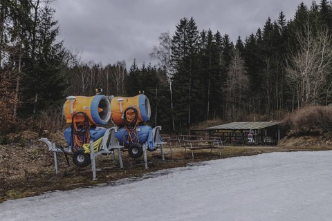 Snow cannons, photographed on a ski slope in the Jizera Mountains ski resort near Albrechtice v