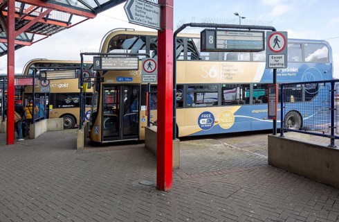 Buses at bus station in town centre, Swindon, Wiltshire, England, UK