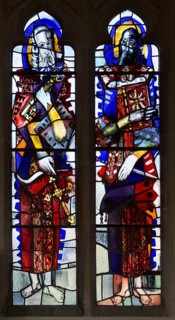 Modern stained glass window in church of Saints Peter and Paul, Marden, Wiltshire, England, UK by