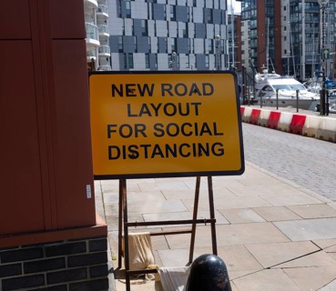 Sign for new road layout for social distancing, Wet Dock waterfront, Ipswich, Suffolk, England, UK