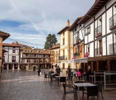 Historic buildings in town of Ezcaray, La Rioja Alta, Spain, cafe bar Ropy in Plaza Conde de