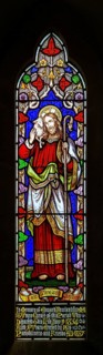Stained glass window the Good Shepherd church of Saint Mary, Hemington, Somerset, England, UK