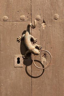 Close up of gecko lizard metal door handle, Frigiliana, Axarquia, Andalusia, Spain, Europe