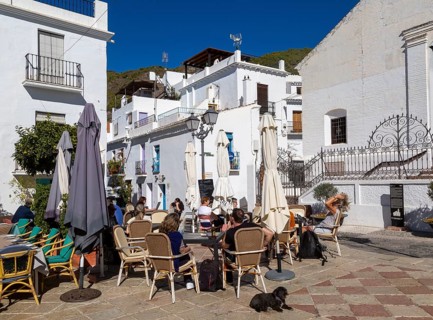 People and cafes in church square plaza, Plaza de la Iglesia, Frigiliana, Axarquia, Andalusia,