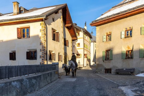 Horsewoman on horseback, historic houses, sgraffito, facade decorations, historic village, Guarda,