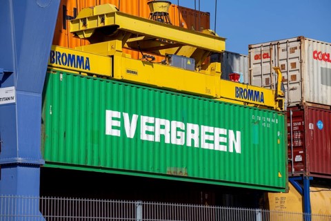 An Evergreen Line container is loaded in the port of Mannheim, Germany. Supply bottlenecks and a