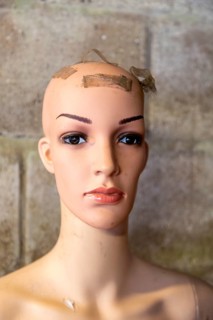 Mannequin model on display in house clearance auction sale room, UK