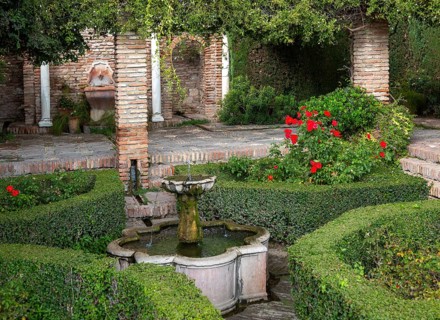 Water fountain in garden of historic Moorish palace Alcazaba, Malaga, Andalusia, Spain, Europe