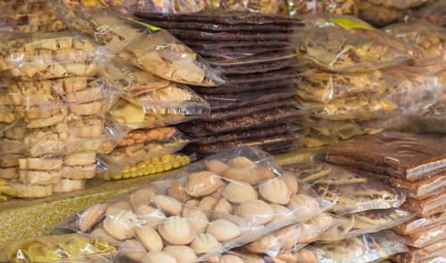 Chinese and Asian food on the market, rice, chips, noodles, sweets
