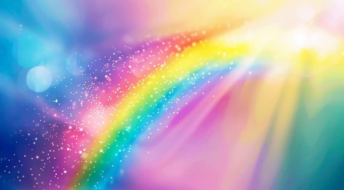 An ethereal abstract of a vibrant rainbow spectrum glowing with soft particles, ai generated, AI