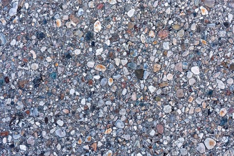Asphalt road surface, enclosed colourful stones, grainy, pattern, structure, background, wallpaper