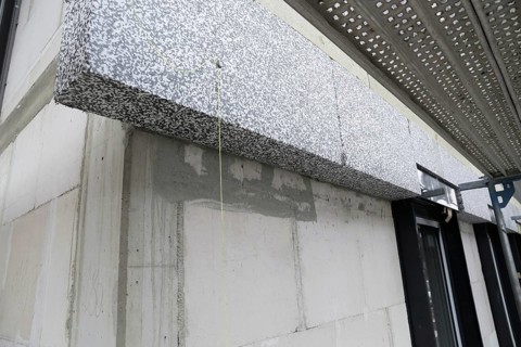 Thermal insulation of a house facade