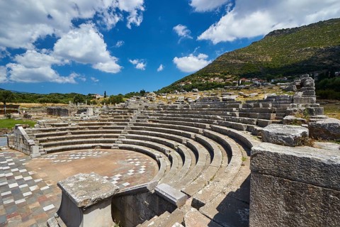 Ancient amphitheatre with stone seats and ruins in Greece, sanctuary of Asclepius, Ecclesiasterion,