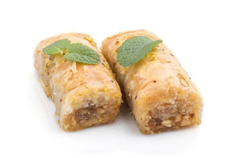 Traditional arabic sweets baklava isolated on white background. side view, close up
