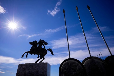 Statue, monument, military leader Alexander the Great on his horse Voukefalas, shields, spears,