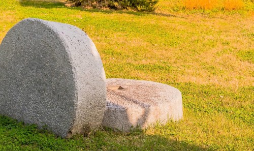 Giant millstone in lawn in South Korea