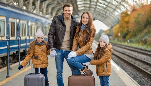 AI generated, A young family wants to travel and waits in the station for the train, 30, 35, years,