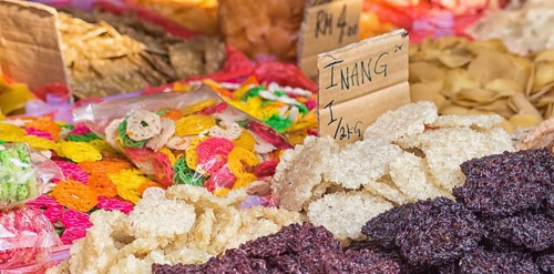 Chinese and Asian food on the market, rice, chips, noodles, sweets