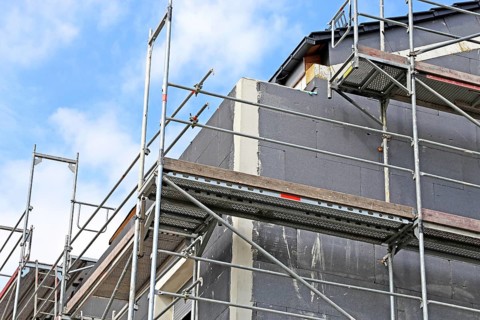 Thermal insulation of a house facade