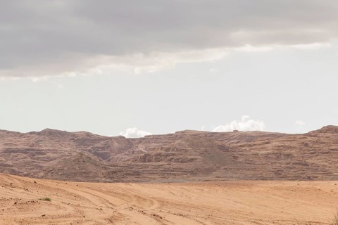 Desert, red mountains, rocks and cloudy sky. Egypt, color canyon, the Sinai Peninsula, Dahab