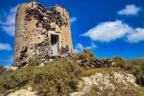 Dilapidated windmill above Emporio, Santorini, Cyclades, Greece, Europe