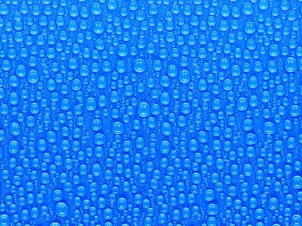 Many water drops on a blue surface, a smiley face is reflected in every drop