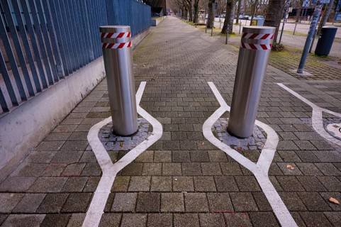 Automatic bollards, with white markings for smartphone junkies, Stuttgart, Baden-Wuerttemberg,