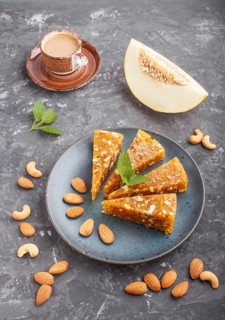 Traditional turkish candy cezerye made from caramelised melon, roasted walnuts, hazelnuts, cashew,