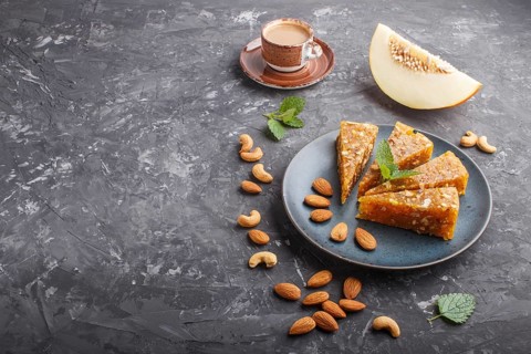 Traditional turkish candy cezerye made from caramelised melon, roasted walnuts, hazelnuts, cashew,