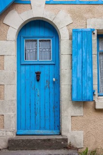Old house facade with blue door and blue window, Ile de Brehat, Brittany, France, Europe