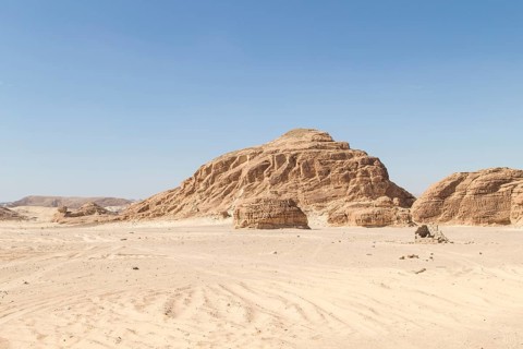 Desert, red mountains, rocks and blue sky. Egypt, the Sinai Peninsula, Dahab