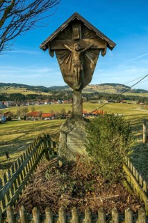 Crucifix with wooden fence on the Buchenberg, Buchenberg, Allgaeu, Bavaria, Germany, Europe