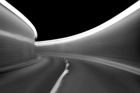 Car tunnel view seen out of a car, motion blur