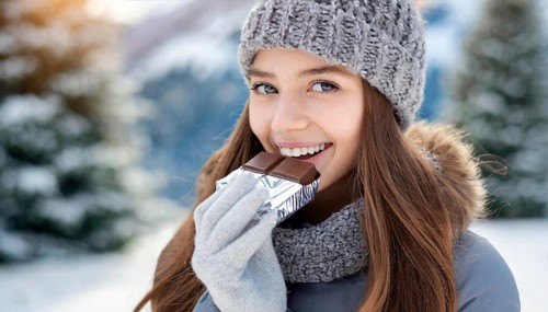 KI generated, Young girl, 15, years, eating a bar of chocolate, one person, outdoor shot, ice,