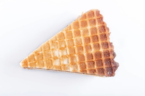 Waffle sandwiches with boiled condensed milk isolated on white background. closeup. top view