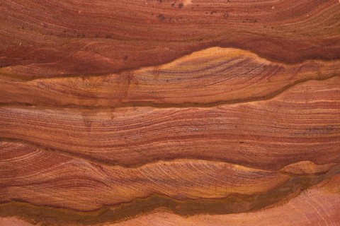 Natural texture of red rocks. Colored canyon, Egypt, desert, the Sinai Peninsula, Nuweiba, Dahab,