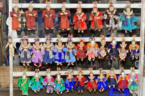 Puppets as souvenirs at Htilominlo Temple, Bagan, Myanmar, Asia