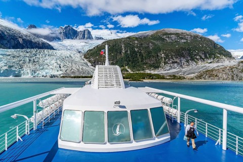 Cruise ship Stella Australis anchors in front of the Pia Glacier, Alberto de Agostini National